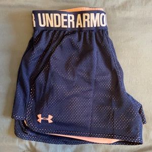 Women’s XS Under Armour Heatgear shorts. Navy blue and light pink.